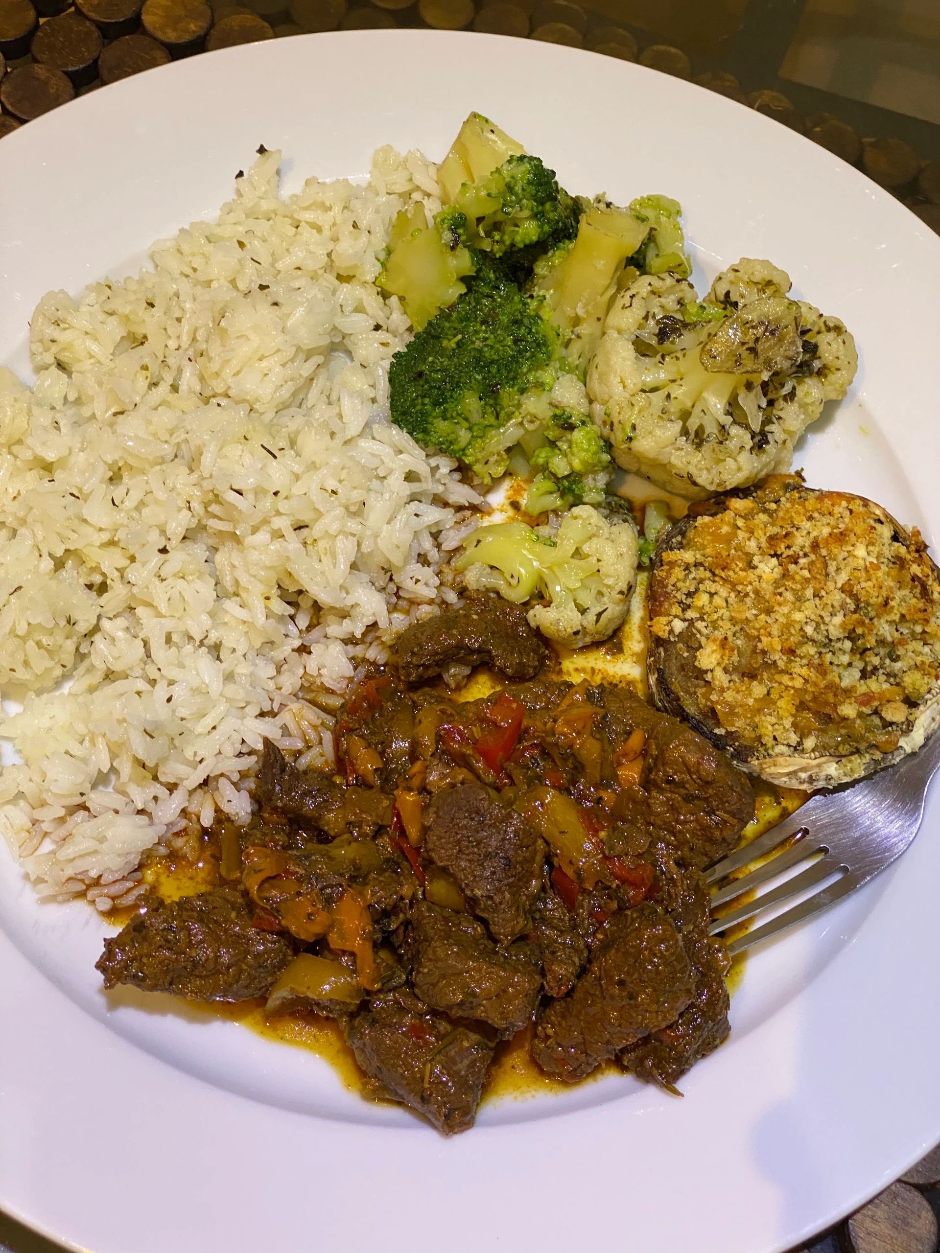 A meal with rice, vegetables and protein