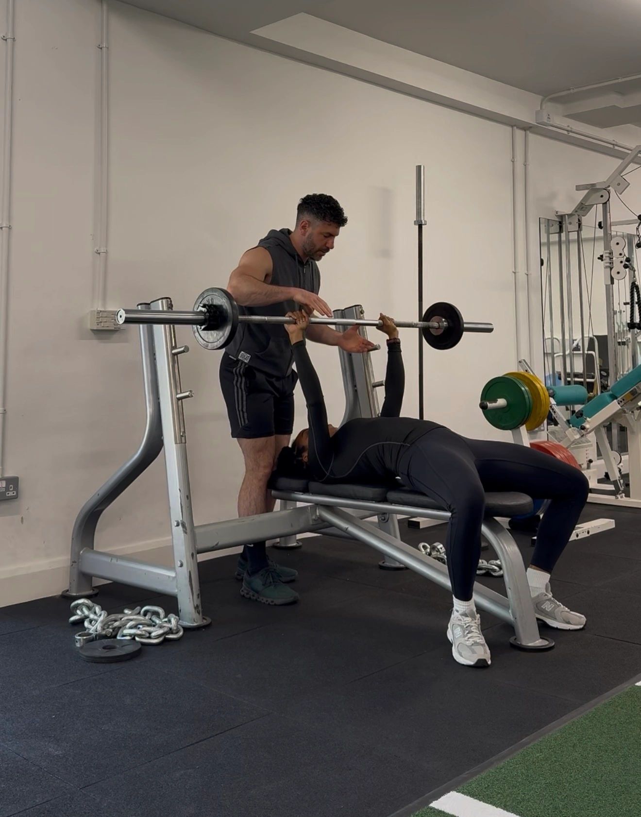 Alexandros coaching a seated strength exercise